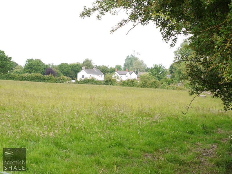 Cambrian oil works, view across works site to cottages that might have been associated with the works. June 2014